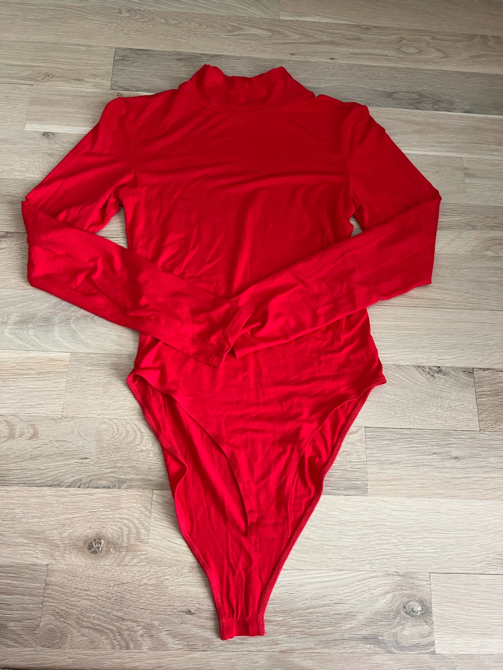 Red long sleeve mockneck bodysuit